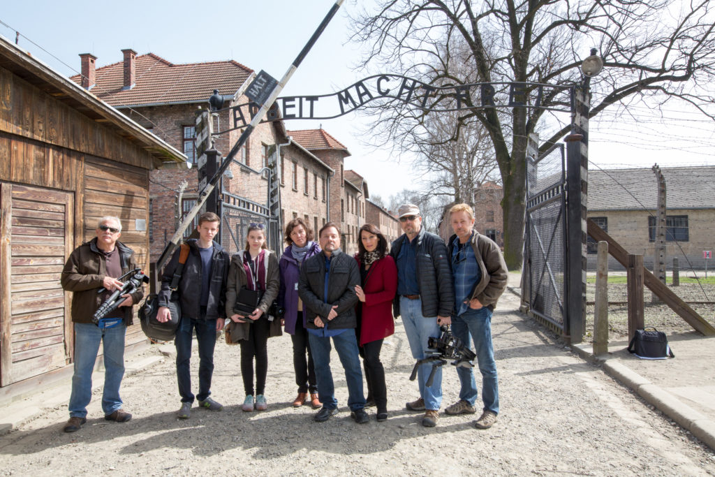 Rev. and Katharine Weiss (4th and 3rd from right) with other members of the production team at the infamous Auschwitz-Birkenau death camp / photo: Ken Berg -- Zola Levitt Ministries (far right)